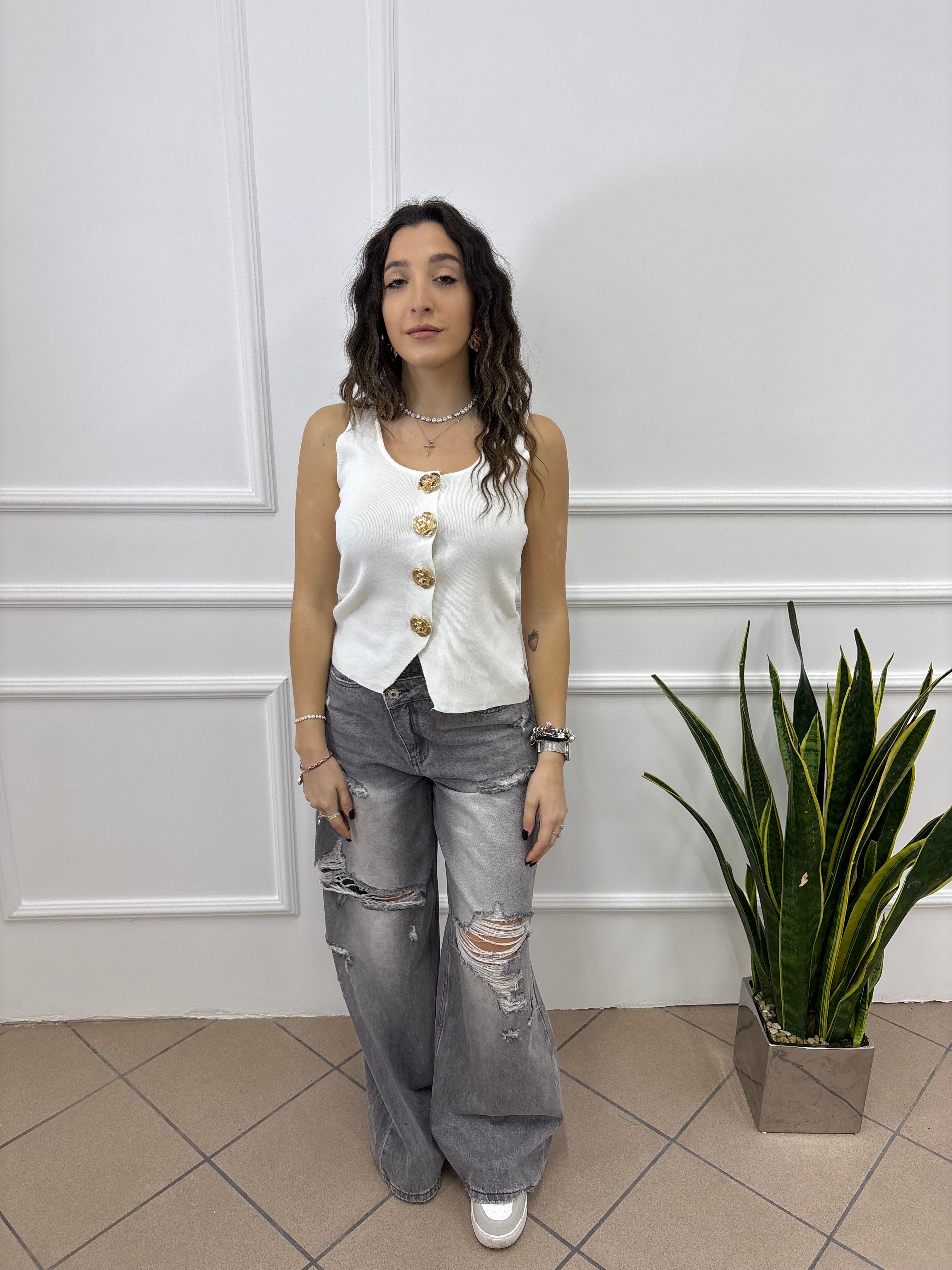 Jeans con zip trasversale