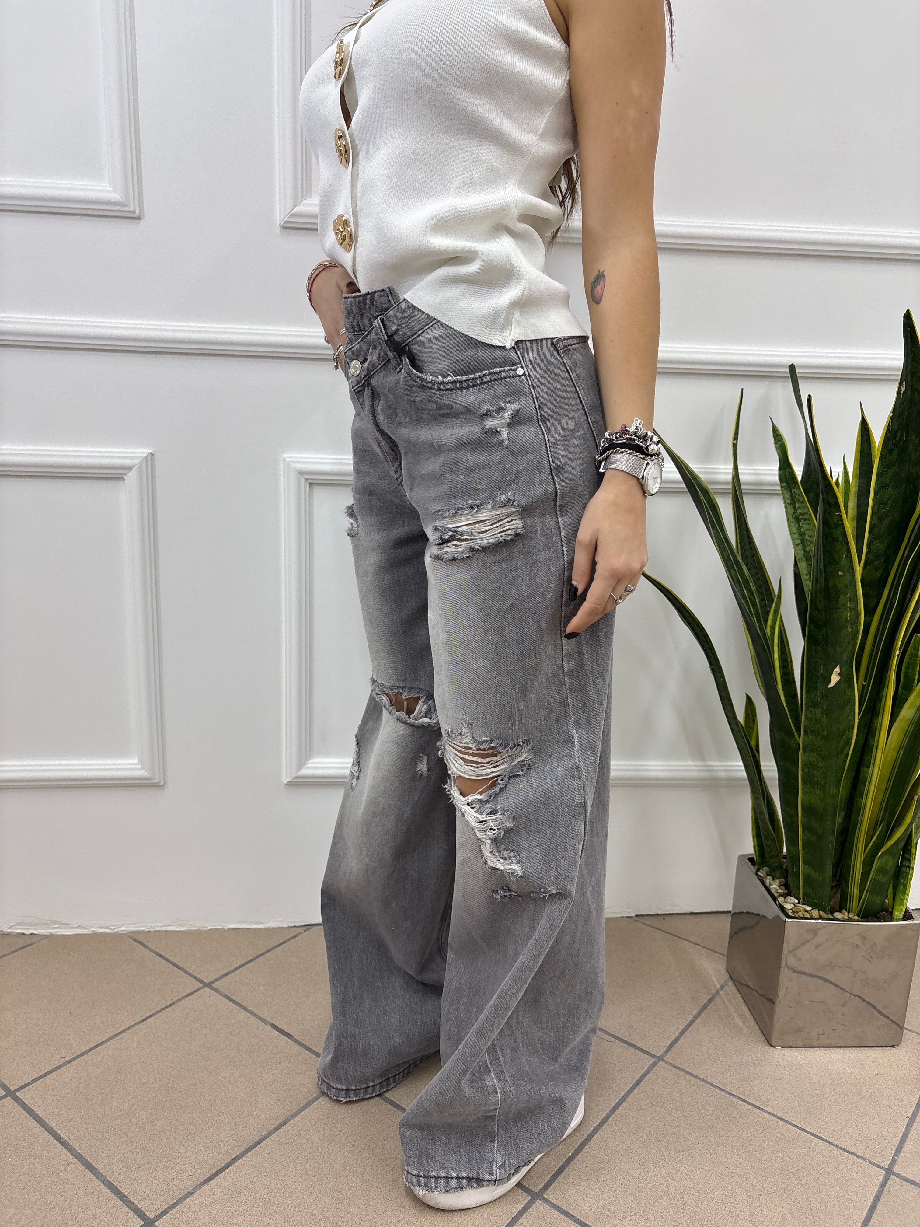 Jeans con zip trasversale
